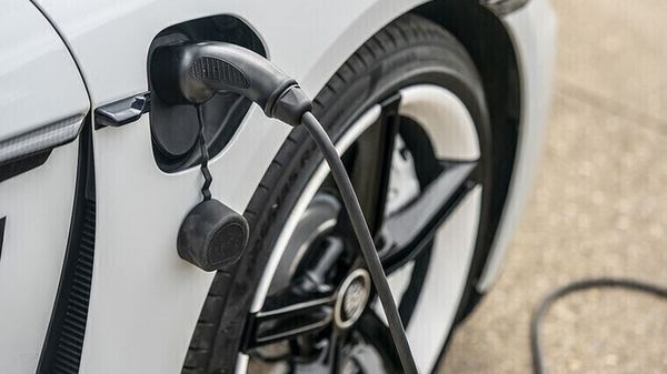 Electric vehicle connected to a charging cable