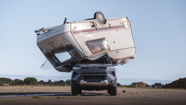 Toyota electric Hilux carrying caravan