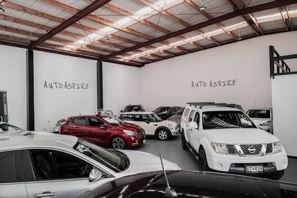 Vehicles inside the Auto Aspire showroom